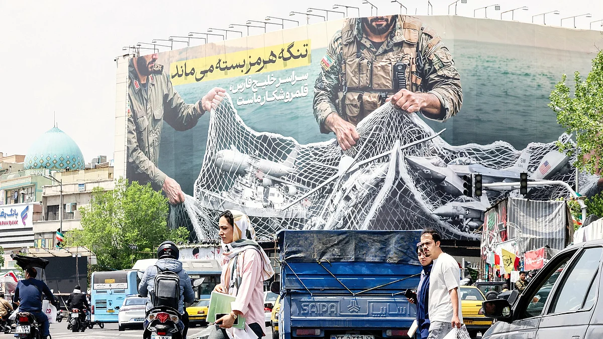 A giant billboard at Tehran’s Revolution Square declares: ‘The Strait of Hormuz remains closed’