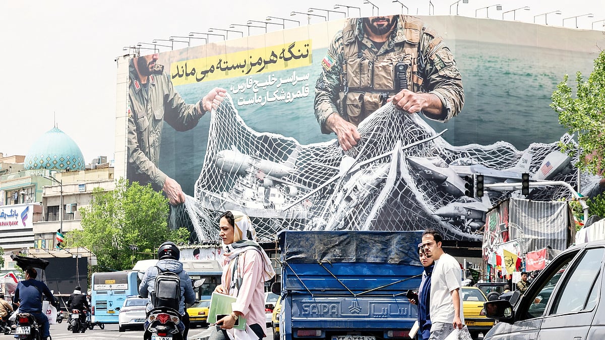 A giant billboard at Tehran’s Revolution Square declares: ‘The Strait of Hormuz remains closed’