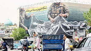 A giant billboard at Tehran’s Revolution Square declares: ‘The Strait of Hormuz remains closed’