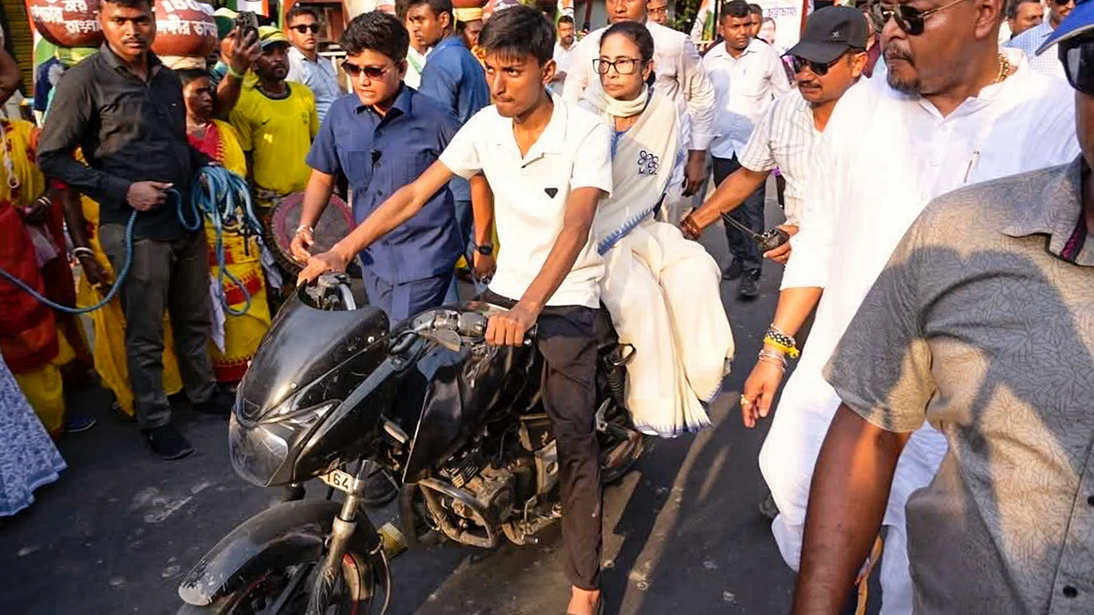 Mamata Banerjee rides pillion as she campaigns in North 24 Parganas district