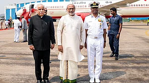 C.P. Radhakrishnan being received by Andhra Pradesh Governor Abdul Nazeer in Visakhapatnam.