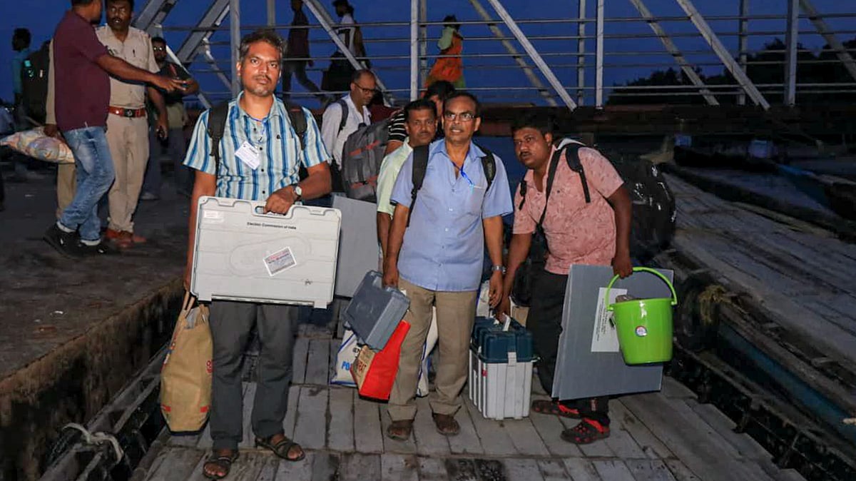 Polling teams ferry election materials to riverine North 24-Parganas ahead of Phase 2 polls.
