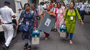 Polling officials leave for their booths with EVMs VVPAT units in Kolkata