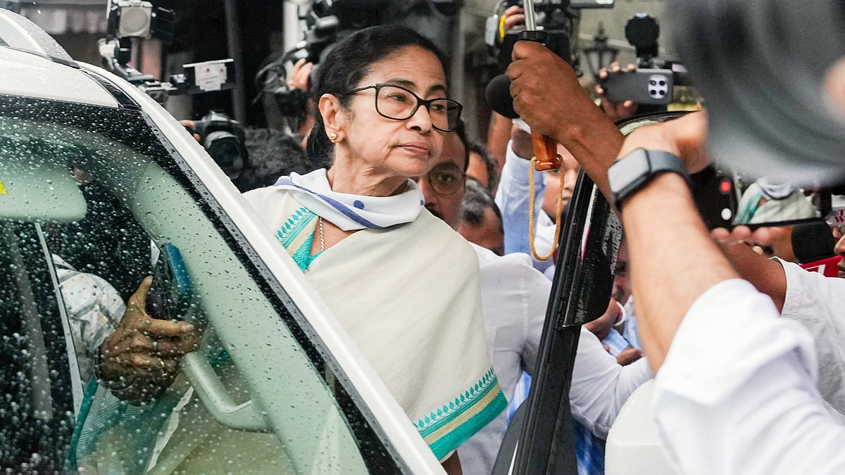 Mamata Banerjee at a polling station during the final phase of Assembly elections, in Kolkata