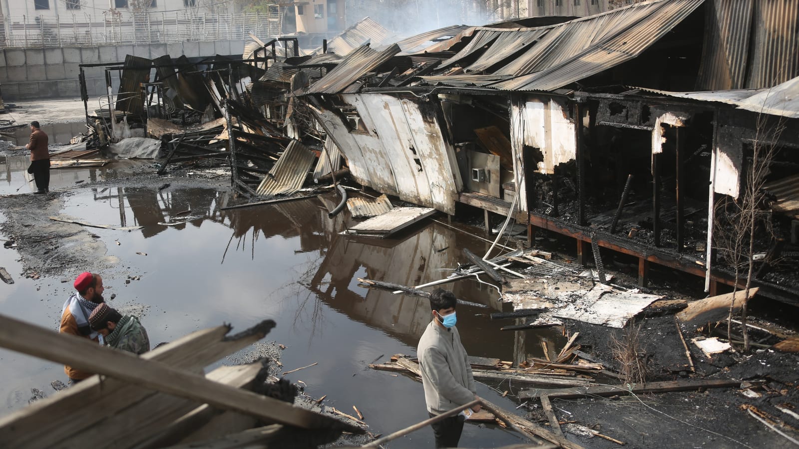 Debris surrounds the Omid Addiction Treatment Hospital in Kabul after an airstrike.