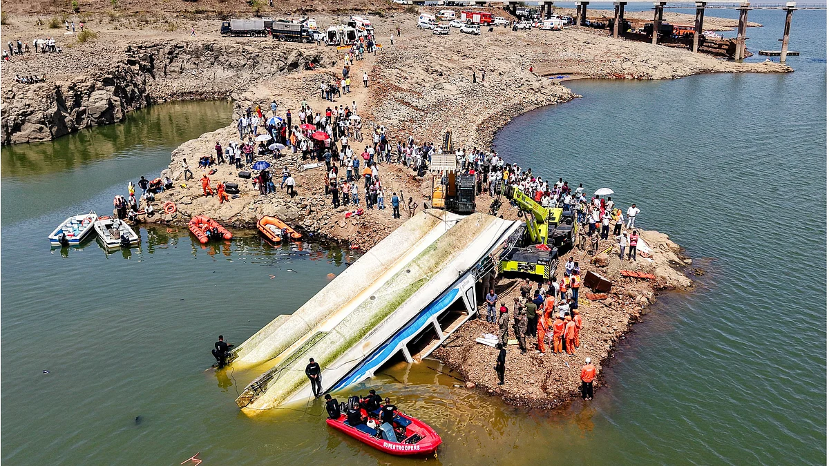 Rescue personnel recover the cruise boat that overturned in Bargi dam due to a sudden storm