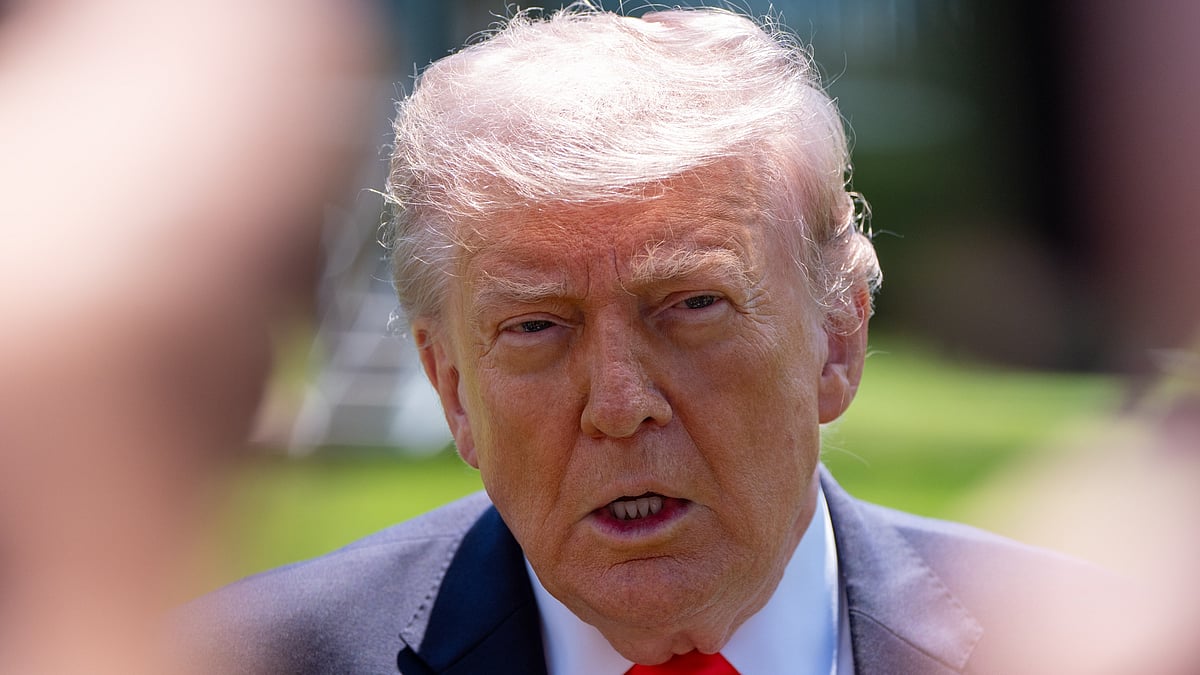 Donald Trump speaks with reporters on the South Lawn of the White House, 1 May