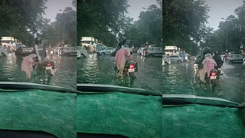 A biker won hearts online after helping an elderly woman cross a waterlogged road in rainy Delhi.