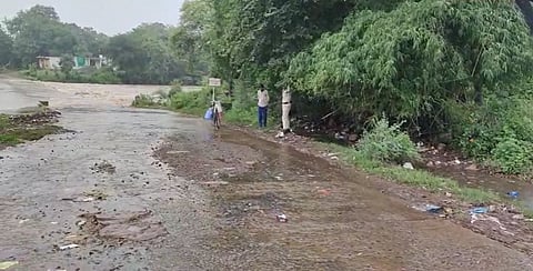 woman swept away in overflowing drain in Panna