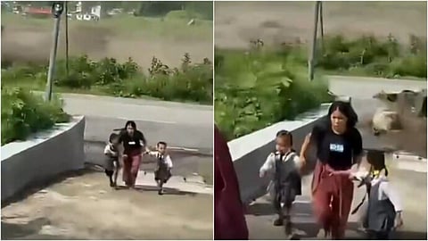 A viral Nepal flood video shows a mother falling while saving her children.