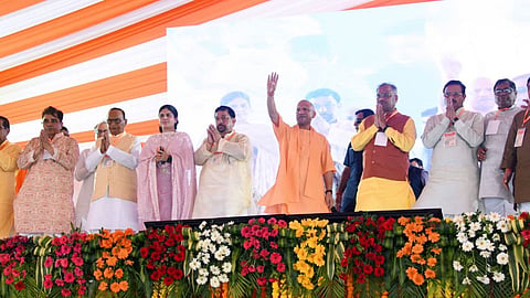 CM Yogi Adityanath Unveils Swami Haridas Auditorium  Distributes Benefits Beneficiaries in Mathura