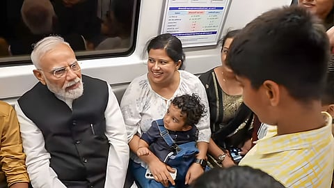 pm modi metro ride photo