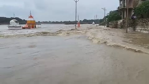 Flood Water Flows Over Roads and Bridges in Datia