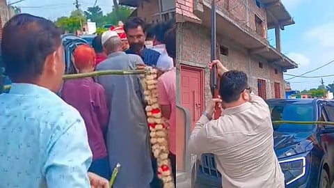 Two Men Firing During a Sheikh's Welcome Procession  