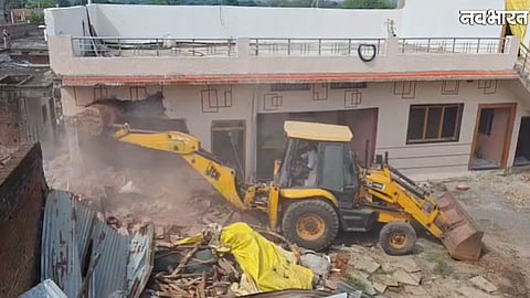 administration demolishes illegal properties of accused in Sagar liquor case