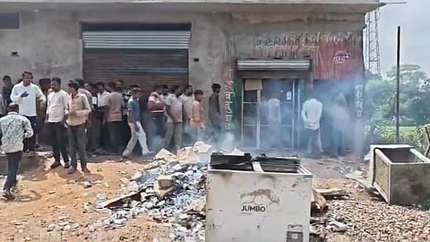 Women protest at a liquor shop in Tikamgarh