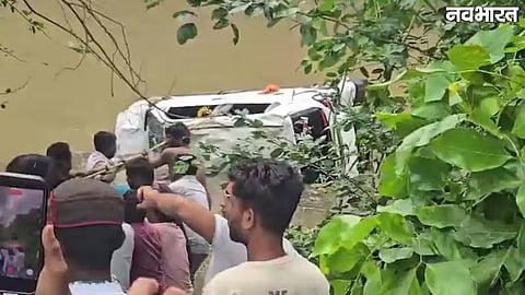 car carrying devotees swept away in Nalkheda drain