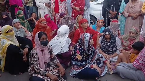 Family members stage a road blockade in Gwalior