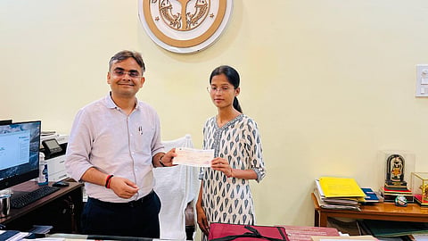Varanasi: DM Satyendra Kumar Hands Over 10 Lakh Cheque to PM CARES For Children Scheme Beneficiary