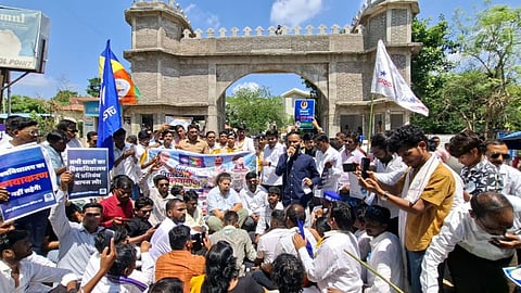 wardha student protest mahatma gandhi hindi university suspension revoked