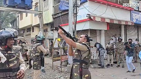 Police firing tear gas shells during a protest near Shahi Masjid in Ujjain
