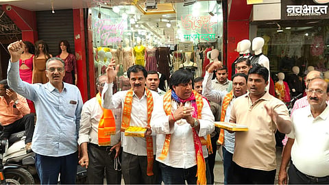 Indore textile traders celebrate with sweets after news of temporary relief from UPI MDR charges