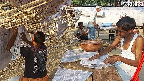 Artisans prepare a 60-foot Ravana effigy