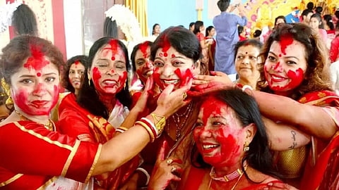 Sindoor khela meaning why women apply sindoor durga puja.