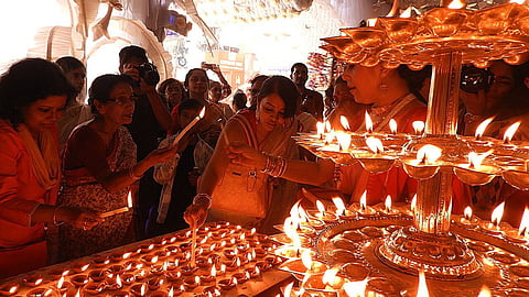 Navratri day 9 why sandhi puja 108 diyas lotus bengal.
