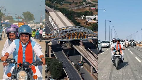 Kailash Vijayvargiya and Tulsi Silawat riding a Bullet motorcycle on the double-decker flyover.
