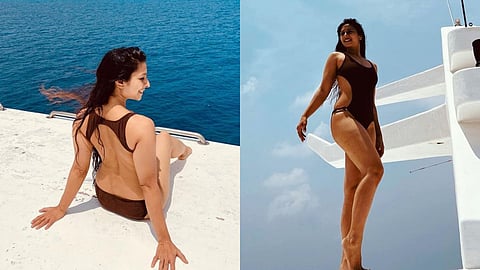 Tanisha Mukherjee Bikini Photos: अभिनेता अजय देवगन (Ajay Devgan) की साली तनीषा मुखर्जी (Tanisha Mukherjee) भले ही बॉलीवुड और अपने एक्टिंग करियर से दूरी बना ली हो लेकिन अदाकारा सोशल मीडिया पर काफी एक्टिव दिखाई देती है। सोशल मीडिया पर बॉलीवुड की बोल्ड अदाकारा तनीषा मुखर्जी के लाखों फैन्स हैं। इसके साथ ही अभिनेत्री सोशल मीडिया पर अपनी बोल्ड तस्वीरें पोस्ट करते समय बिलकुल भी हिचकिचाती नहीं। इसी बीच एक बार फिर तनीषा मुखर्जी ने अपनी बिकिनी फोटाज पोस्ट सोशल मीडिया पर तहलका मचा दिया हैं। इसमें अदाकारा मरून कलर की बिकिनी में नजर आई। तनीषा मुखर्जी का ये अंदाज उनके फैंस को दीवाना बना रहा है। मालूम हो कि अदाकारा ने एक के बाद एक अपनी कई बिकिनी तस्वीरें सोशल मीडिया पर पोस्ट की हैं। आप भी देखें इन तस्वीरों को- (फोटो साभार- @Tanisha Mukherjee)