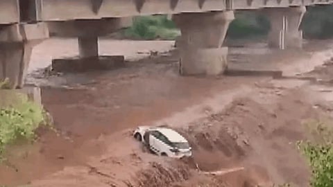 Haryana-Panchkula-rain-river-car