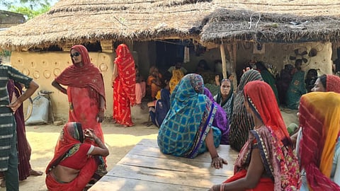 The weeping relatives of the dead girls