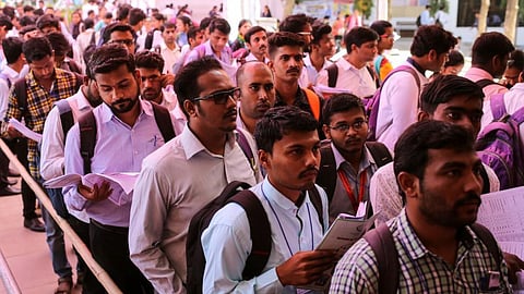 India's unemployment rate falls to 5.2% in July