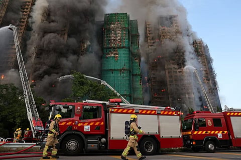 The high-rise echoed with screams... A fire at the shelter claimed 128 lives; bodies are still being recovered from the building.