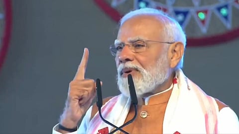 PM Modi Assam visit Guwahati Airport new terminal inauguration