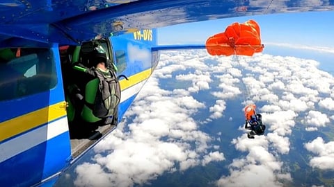 A skydiver survived after his parachute got tangled with the plane’s tail at 15,000 feet, escaping the danger with quick thinking.
