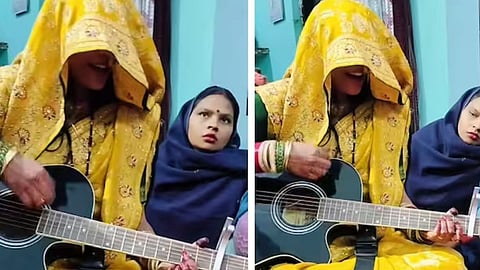 A woman’s soothing ghunghat-clad guitar performance has gone viral on social media.