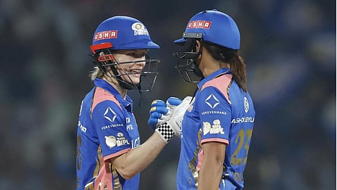 WPL 2026: Harmanpreet Kaur's explosive half-century leads Mumbai Indians to a dominant 7-wicket victory over Gujarat Giants.