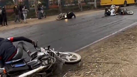 A viral video from Amroha shows bikers slipping and falling on a slippery road caused by sugarcane residue and light rain.