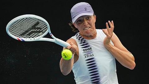 Swiatek & Djokovic into round two