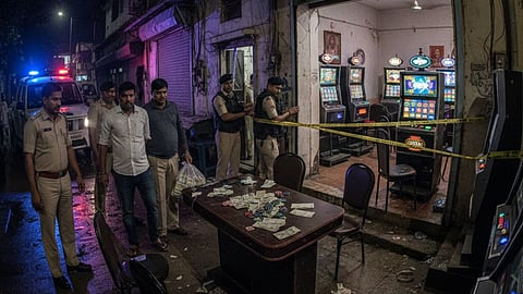 Nagpur police raided an illegal gambling den seized 17 slot machines in Pachpaoli
