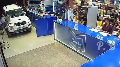 A Scorpio SUV driven into a liquor shop in Rudrapur sparks outrage online.