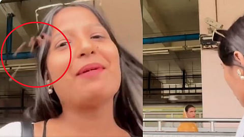 A video showing a girl being spat on at a metro station after refusing to give money has sparked outrage on social media.