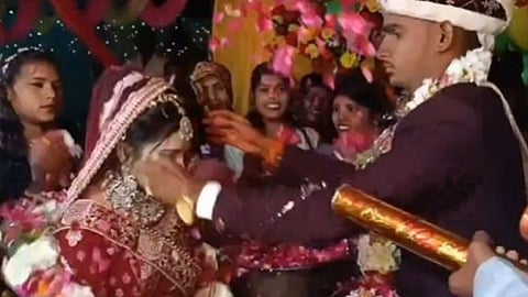 A garland exchange clash between bride and groom during a wedding ceremony has gone viral on social media.