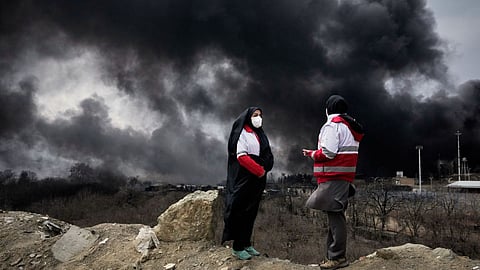 The Iran war casts a 'toxic' shadow on Pakistan, with black rain pouring from the sky; smoke billowing across the 900 km border.