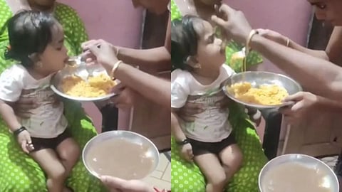 A viral video shows a baby being tricked into eating ragi by showing noodles.