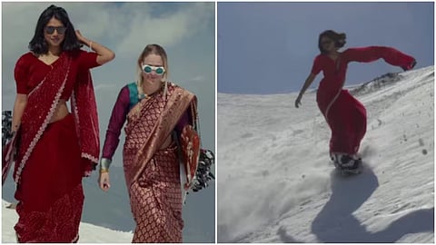 A viral video shows two women snowboarding down a snowy mountain while wearing sarees.