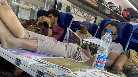 A viral photo of a passenger placing his feet on a food tray in a Vande Bharat train has sparked a debate on civic sense.