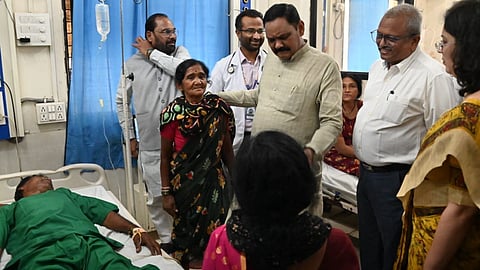 Guardian Minister Dr. Ashok Uike met farmers hospitalized after consuming poison over a land dispute in Chandrapur. District administration clarifies stance on Ultratech Cement mining and legal status.
